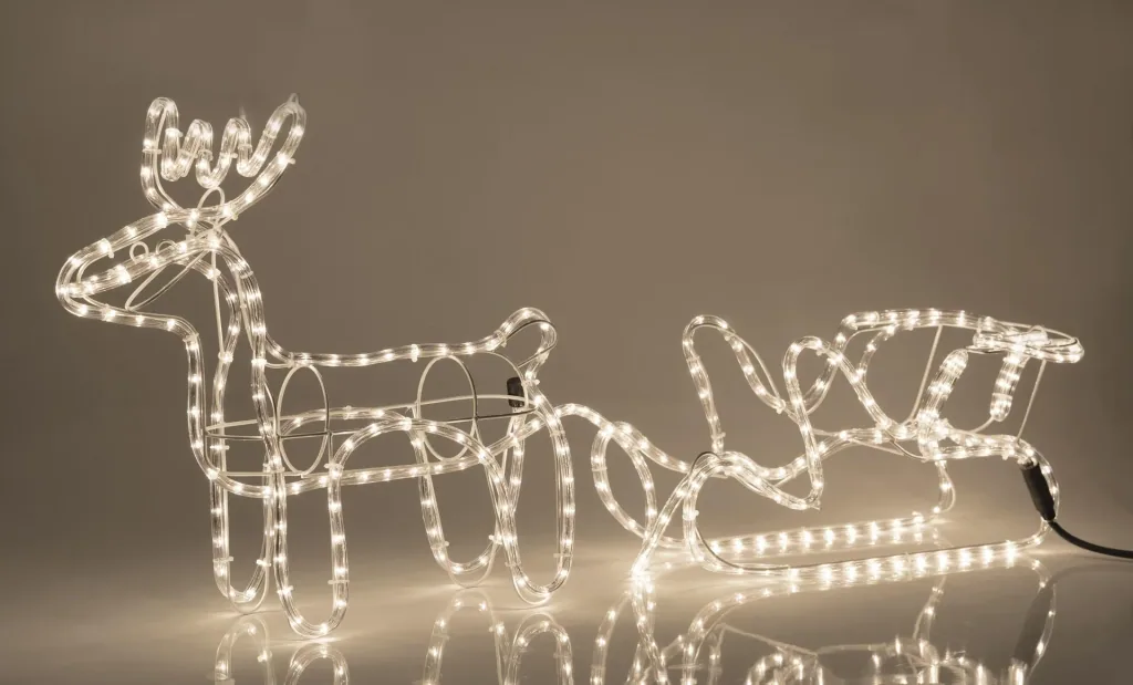 LED Rentier mit Schlitten, warmweiß