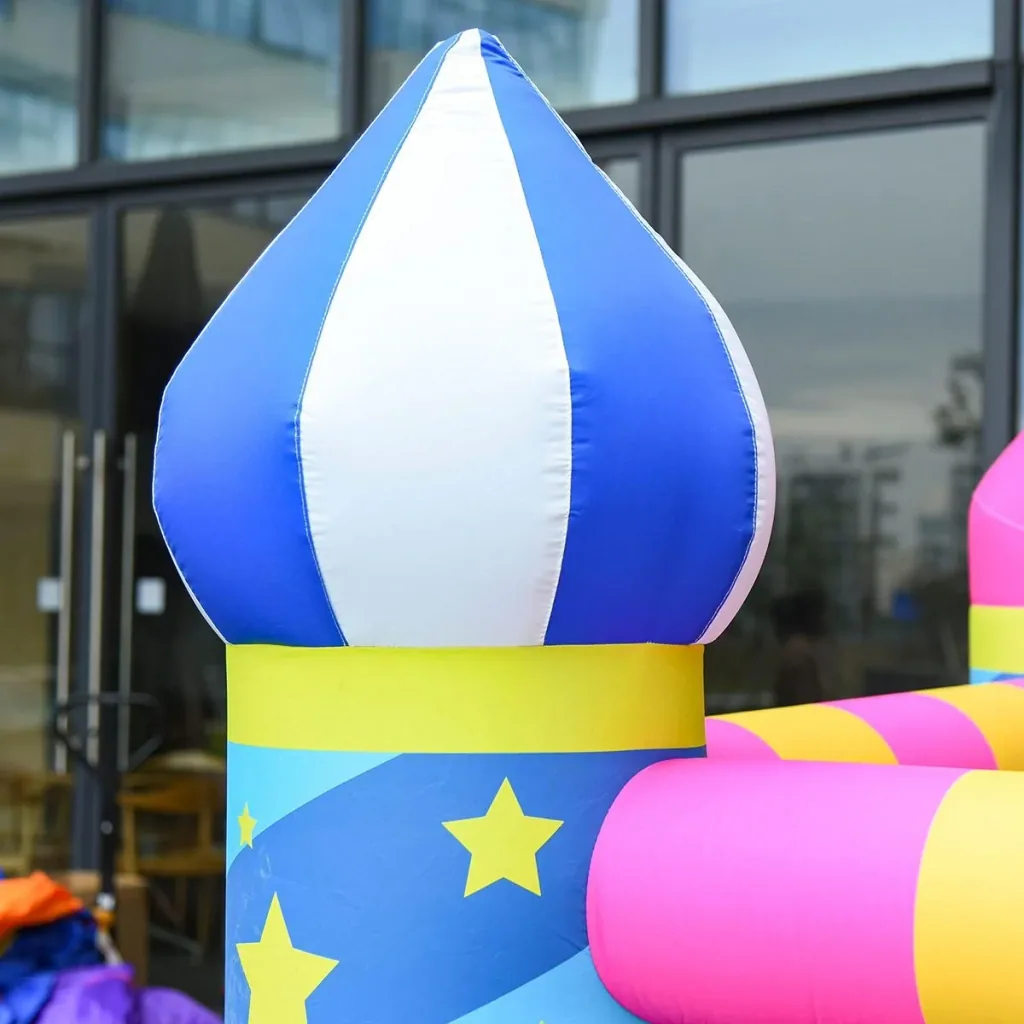 Kinderhüpfburg im Schloss- und Sternen Design bunt