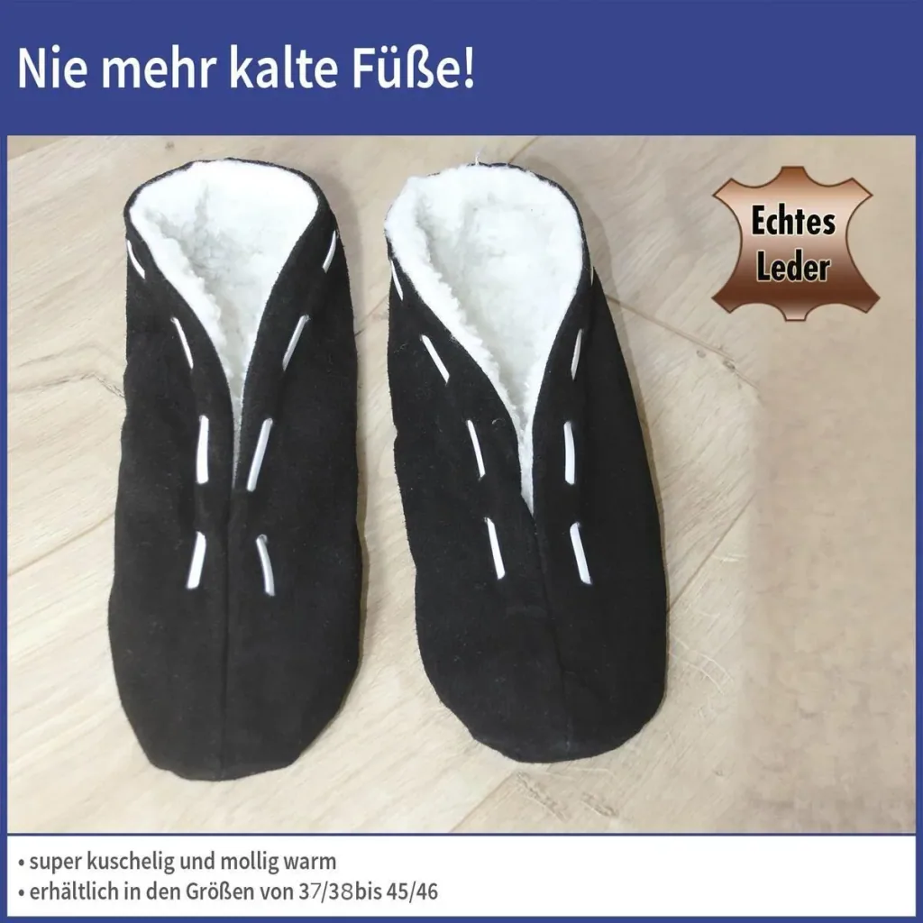 Fellhausschuhe, schwarz, Größe 45/46