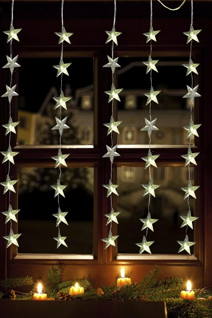 Lichtervorhang mit Sternornamenten und 40 warmweißen LEDs